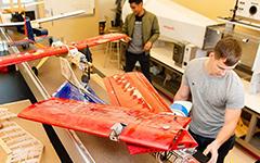 Students working on drone plane.